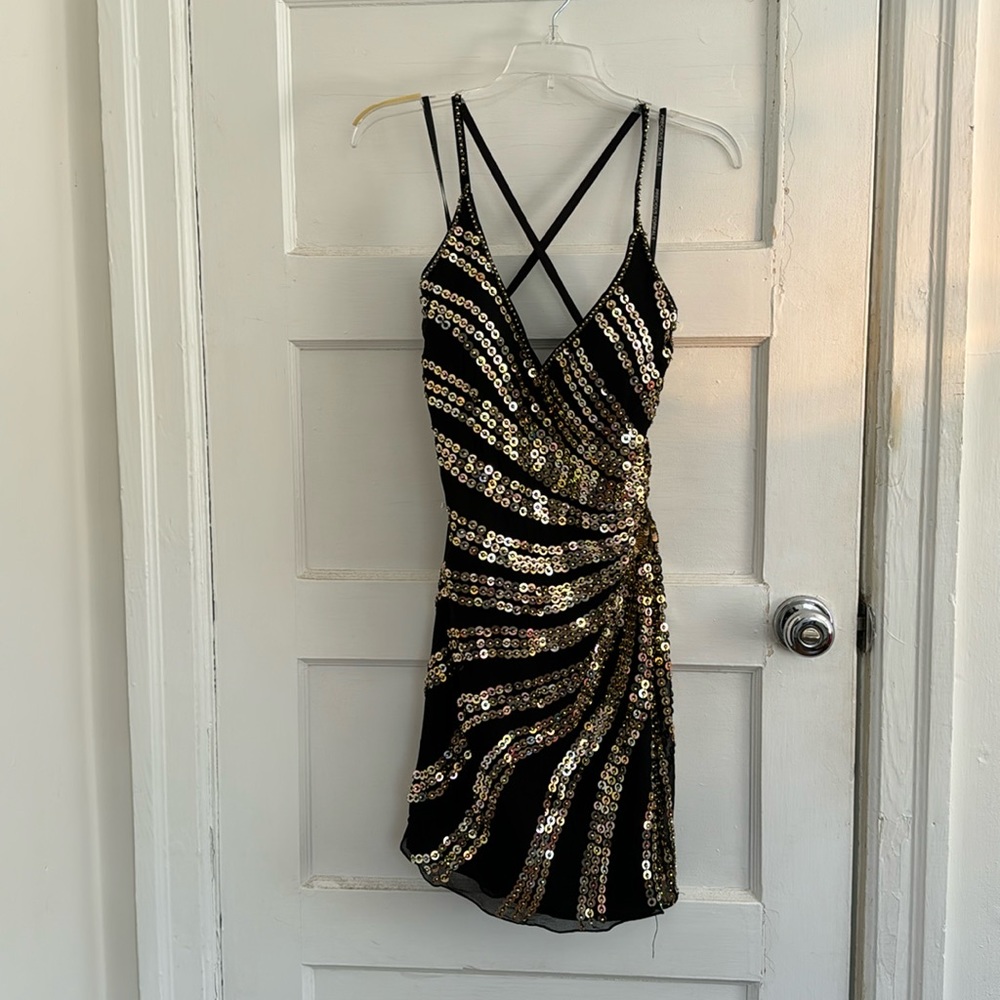 Black dress with gold sequins